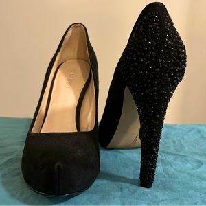 Nine West black suede “cold feet” pumps.  Worn only once for a wedding.